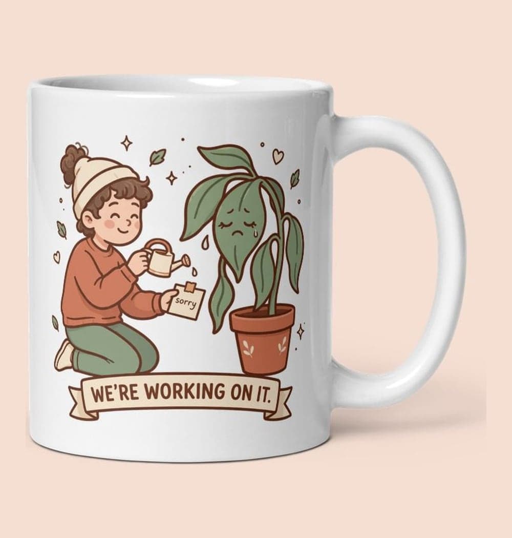 A gentle cartoon of a person offering a tiny watering can and an apology note to a melodramatically drooping houseplant, on a mug (example made with AI)
