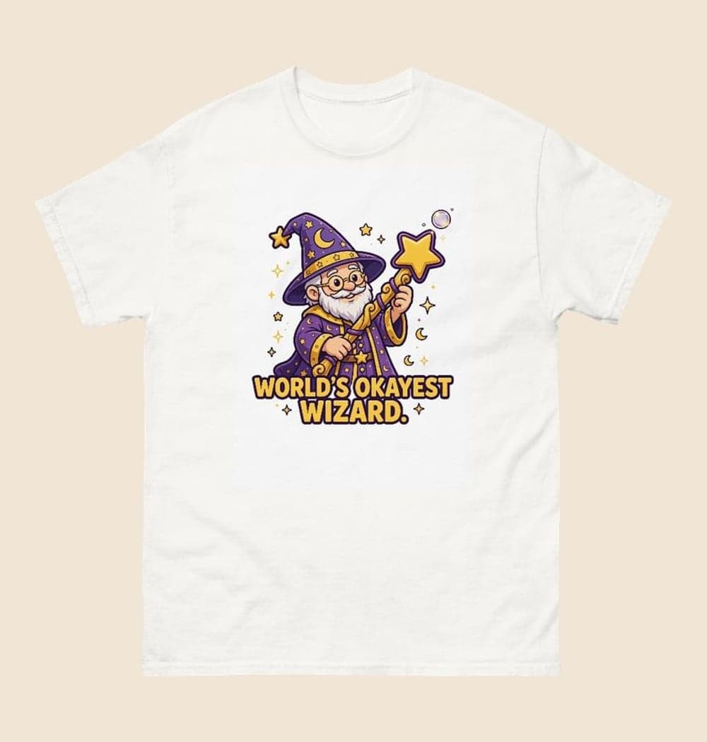An original cartoon wizard proudly conjuring one tiny soap bubble from an oversized wand, on a t-shirt (example made with AI)