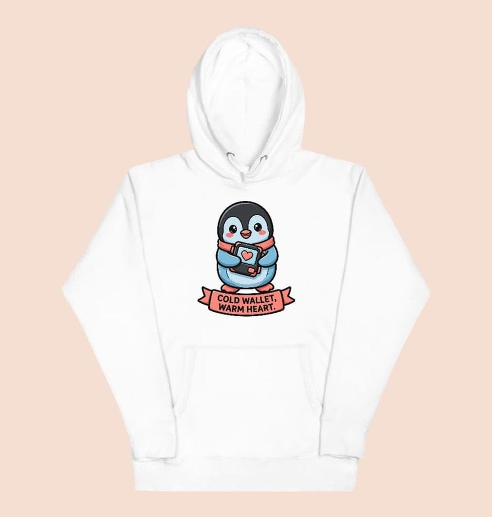 An original cartoon penguin hugging a small generic hardware wallet with a heart on its screen, on a hoodie (example made with AI)