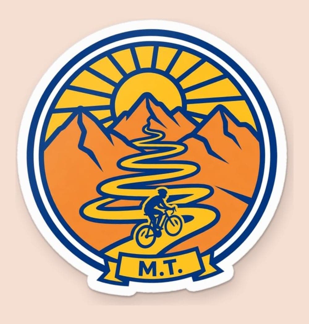 An original crest showing a cyclist riding toward a mountain pass, with a curving trail and rising sun, as a sticker (example made with AI)