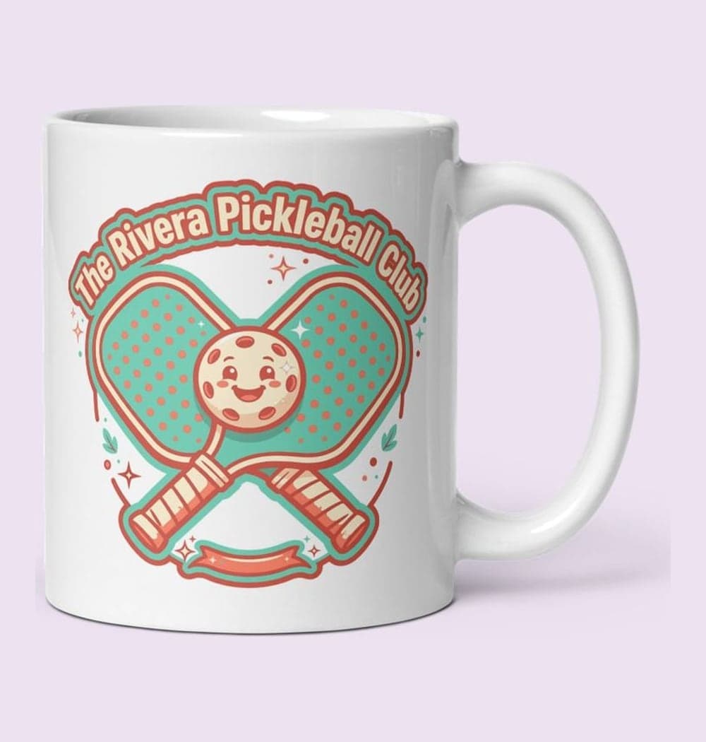A playful original badge with two crossed paddles, a smiling ball, and the supplied club or household name, on a mug (example made with AI)