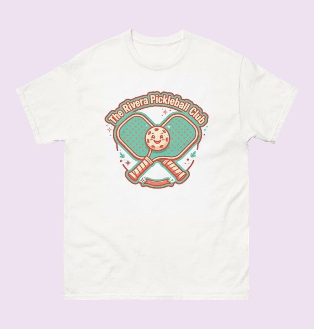 A playful original badge with two crossed paddles, a smiling ball, and the supplied club or household name, on a t-shirt (example made with AI)