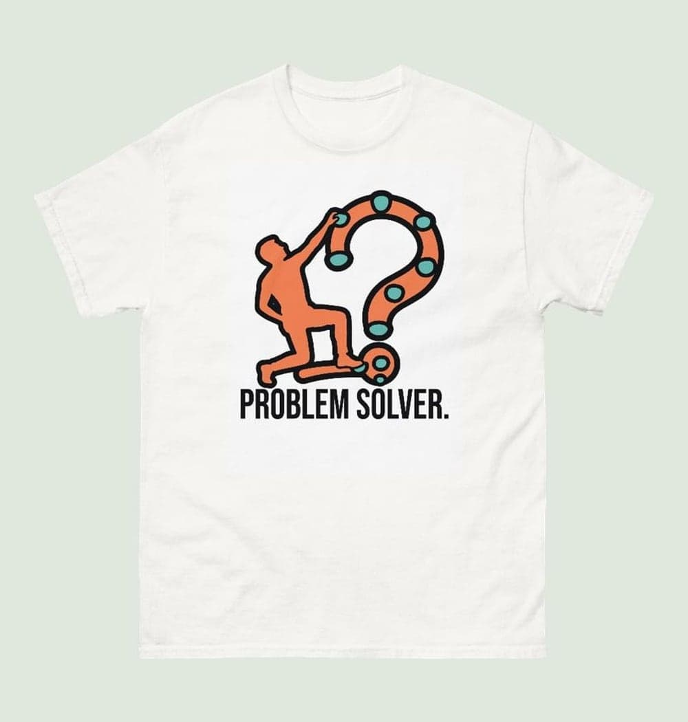 A bold graphic of a climber reaching for a final hold, with the climbing route forming a subtle question-mark shape, on a t-shirt (example made with AI)
