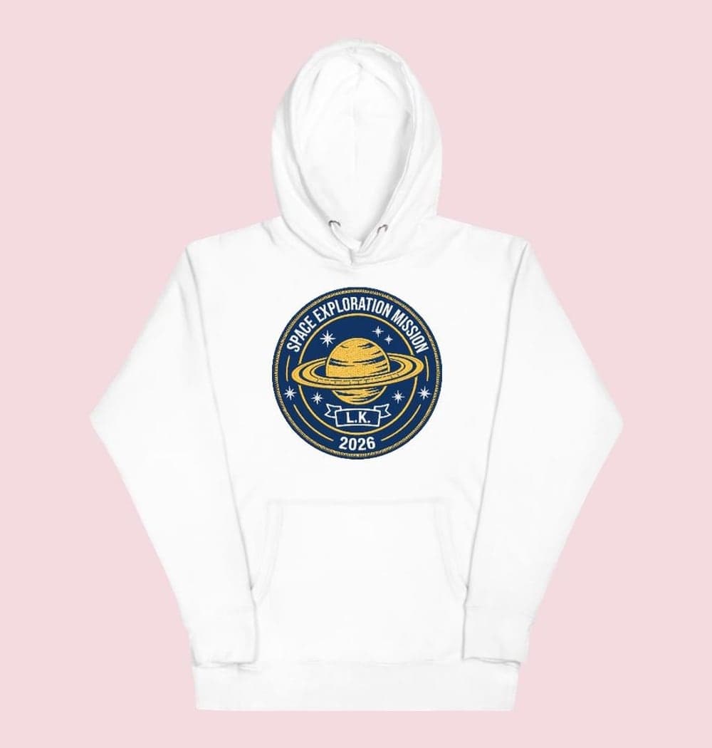 An original space-exploration mission patch using the initials, chosen year, and favorite celestial object, on a hoodie (example made with AI)