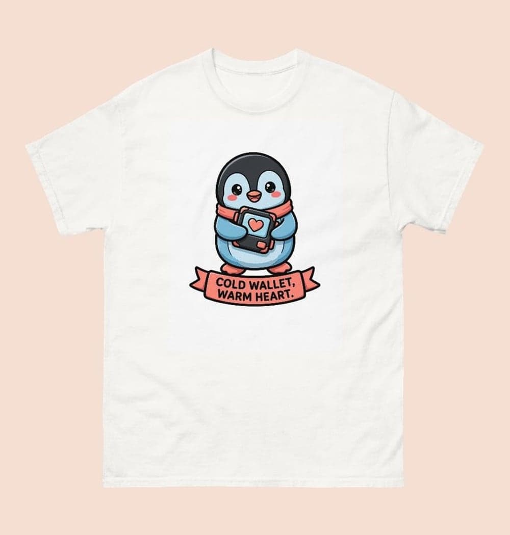 An original cartoon penguin hugging a small generic hardware wallet with a heart on its screen, on a t-shirt (example made with AI)