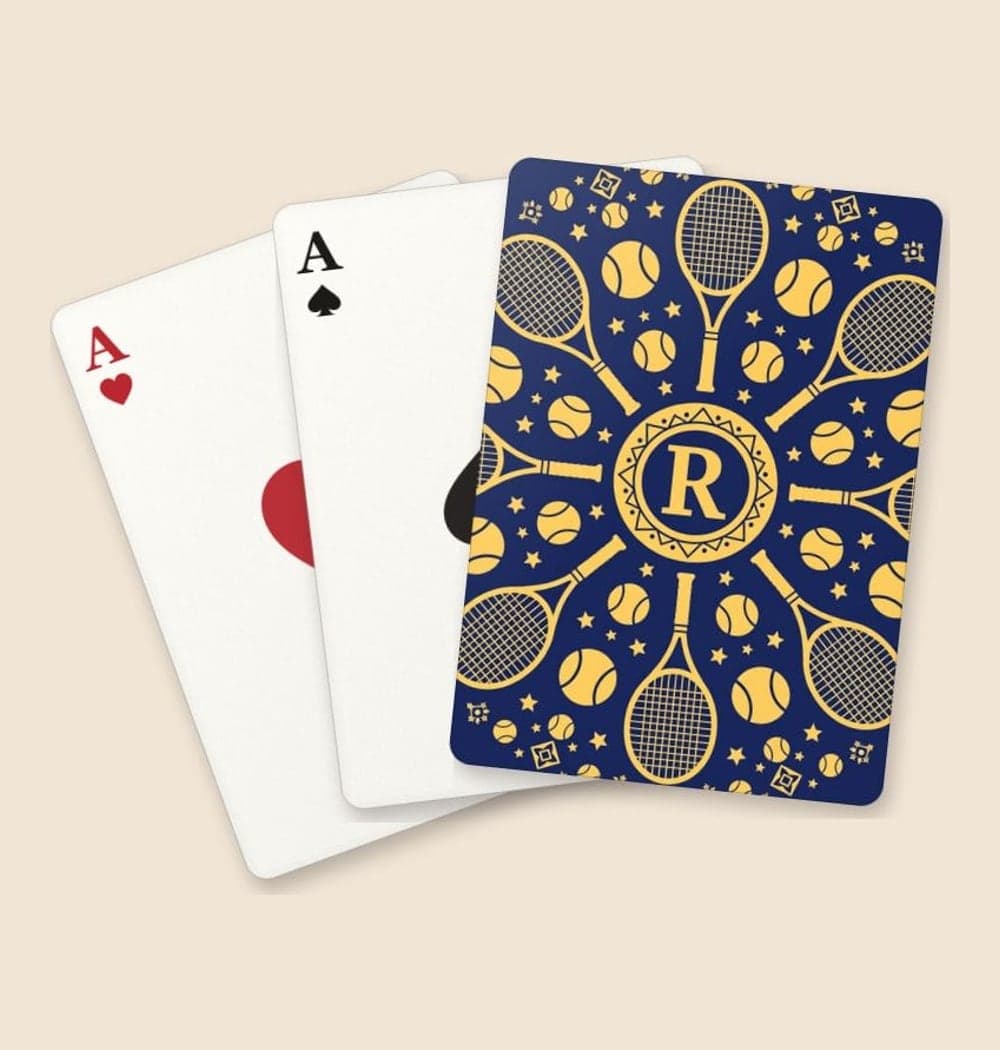 An original rotationally symmetric pattern of equipment from the favorite sport, small stars, and a central monogram, on playing cards (example made with AI)