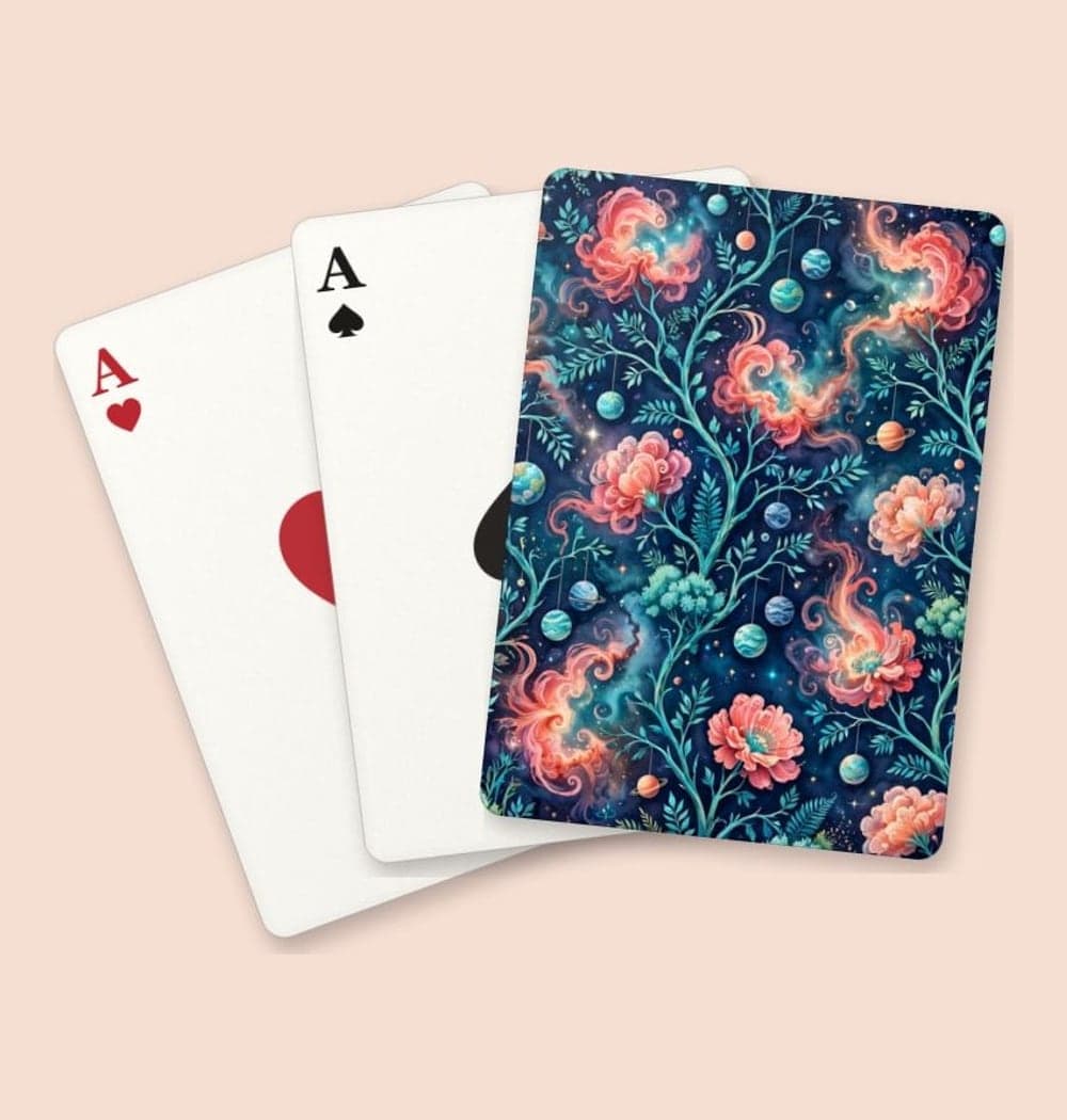 A lush imaginary garden where flowers resemble nebulae and tiny planets hang like fruit from delicate branches, on playing cards (example made with AI)